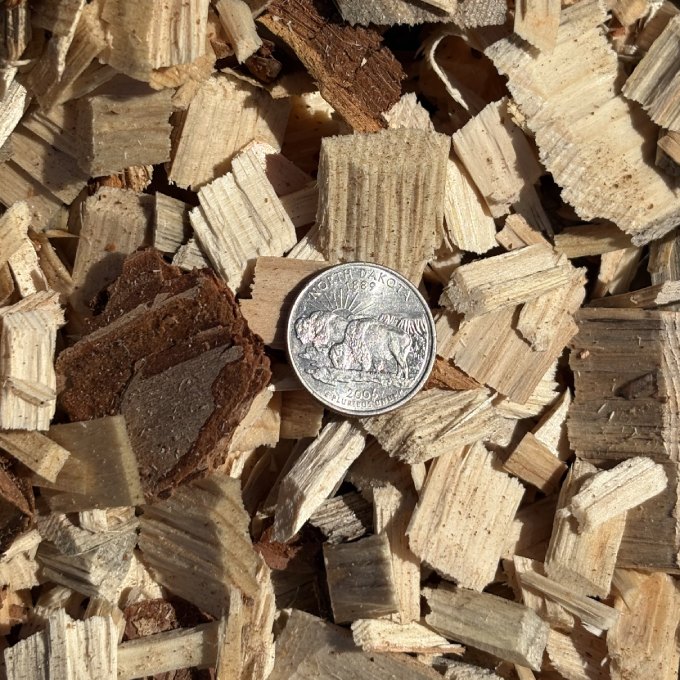 Bulk wood chips for commercial landscaping and large-scale ground cover projects.